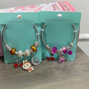 Stainless Steel Charm Bracelets with Gold and Purple Accents